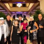 BallenIsles Members share a toast in BallenIsles Grand Lobby during Great Gatsby-style Soiree celebrating $35 million Clubhouse Grand Opening
