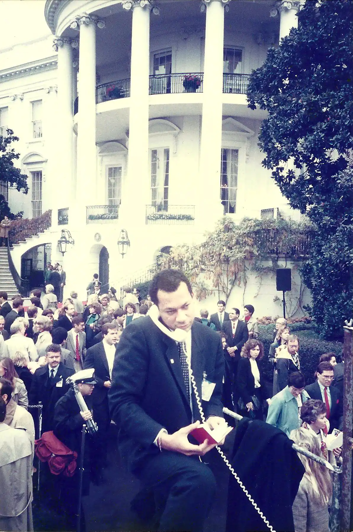 Mark Hopkinson coordinating a news feed during a White House news conference